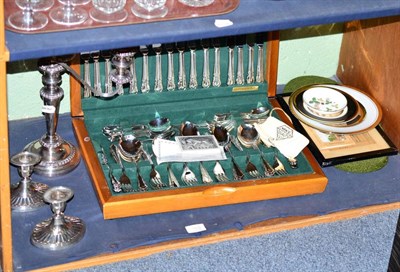 Lot 185 - A canteen of silver plated cutlery, silver plated candelabra, a pair of dwarf candlesticks, etc