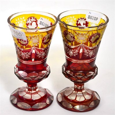 Lot 190 - A pair of 19th century ruby and amber flash glass goblets