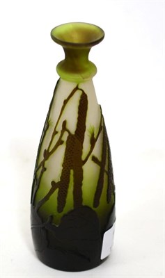 Lot 197 - A Galle style cameo glass vase, cut with hanging foliage on a green/white ground, signed in the...