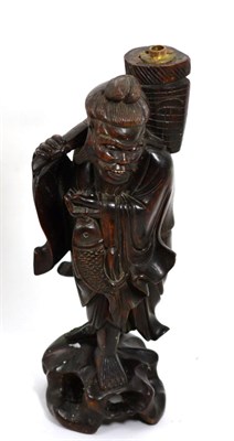 Lot 198 - A carved hardwood figure