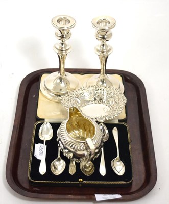 Lot 211 - A pair of silver candlesticks, silver cream jug, pierced silver dish and a cased set of six...