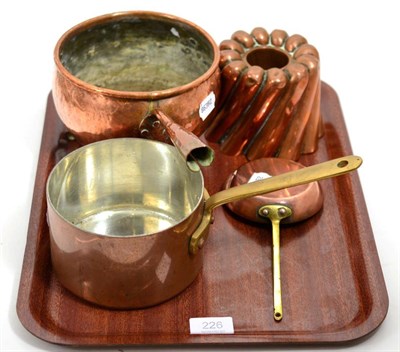 Lot 226 - Copper wares comprising Arts & Crafts pan; jelly mould; saucepan and skillet (4)