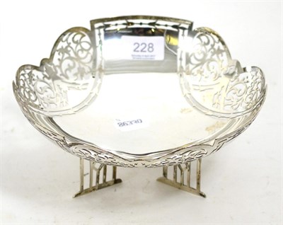 Lot 228 - A silver pierced and footed centre bowl by Walker & Hall Sheffield