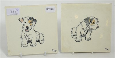 Lot 277 - A pair of Poole pottery tiles printed with dogs after Cecil Aldin