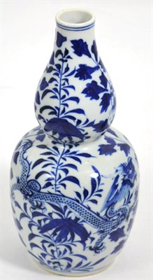 Lot 279 - A Chinese porcelain blue and white double gourd vase