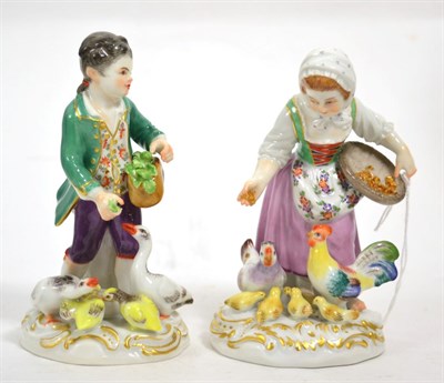 Lot 285 - A pair of Meissen figures with chickens