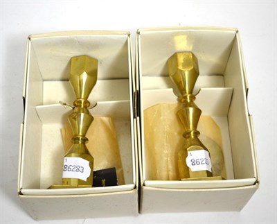 Lot 304 - A pair of Metallslojden Gusum brass candlesticks, no 332, dated 1980 and monogrammed GJ (boxed)