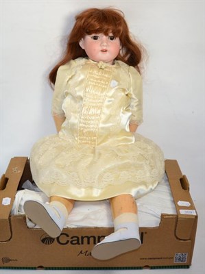 Lot 309 - Armand Marseille 390 large bisque head child doll; Merrythought teddy bear and a dolls pram,...