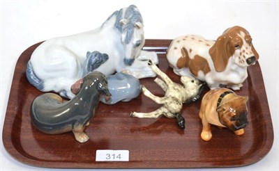 Lot 314 - A group of Royal Copenhagen including two dog models and a horse and foal, together with a...