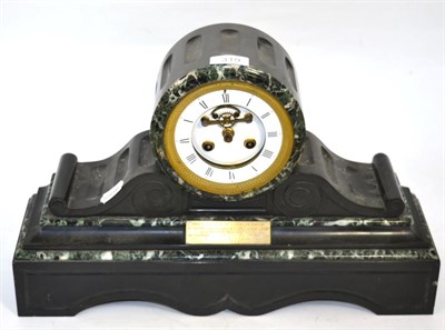 Lot 319 - A variegated marble and slate striking mantel clock, the skeletal dial and enamel chapter ring with