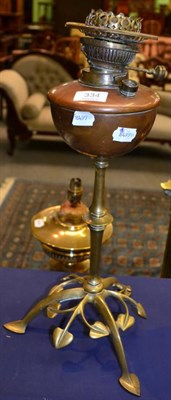 Lot 334 - An Art Nouveau brass and copper lamp