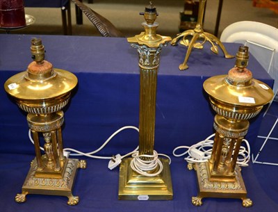 Lot 335 - A brass corinthian column table lamp and a pair of brass columnar table lamps (one a.f.), all...