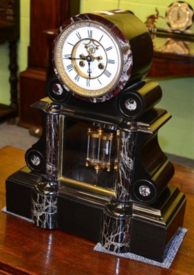 Lot 344 - A French slate mantel clock