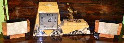 Lot 346 - An Art Deco style, marble clock with associated vases  (3)  (minor damage)