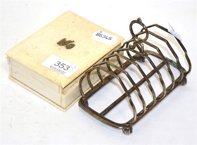 Lot 353 - A silver toast rack and an early 20th century ivory box