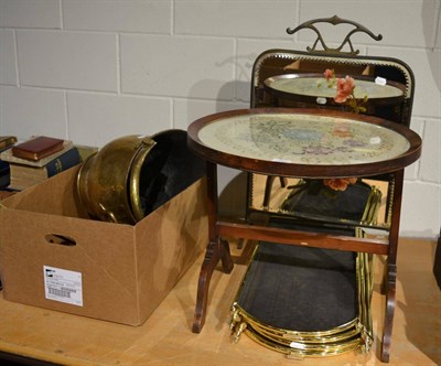 Lot 1001 - A brass four leaf spark guard, a brass companion set, a coal bucket, and a chestnut roaster