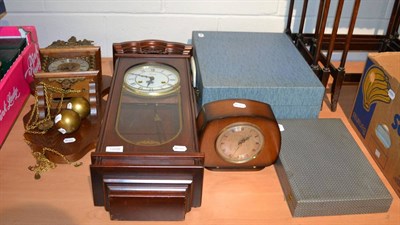 Lot 1008 - A vintage picnic set; three various clocks and a cased cutlery set