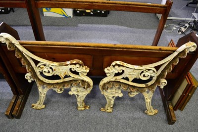 Lot 1034 - A pair of Victorian cast iron bench ends