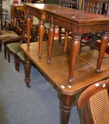 Lot 1055 - An Edwardian oak extending dining table with turned legs, a pair of modern occasional tables...