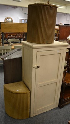 Lot 1069 - A painted pine cabinet, lloyd loom basket and another similar