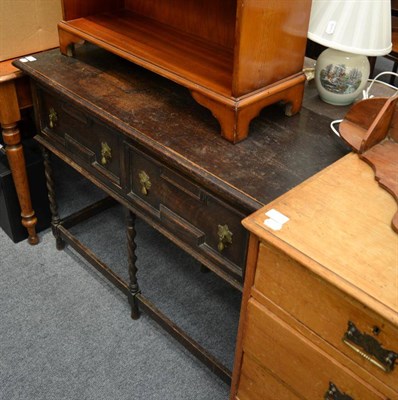 Lot 1071 - An oak dresser base/hall table with two drawers