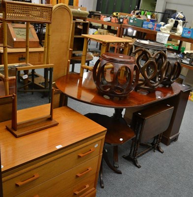 Lot 1076 - A teak three height chest of drawers, dressing table mirror, two occasional tables, three...