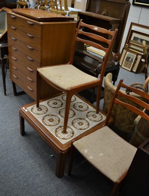 Lot 1080 - A retro chest of drawers, a tiled coffee table, McIntosh inlay tray/wall hanging