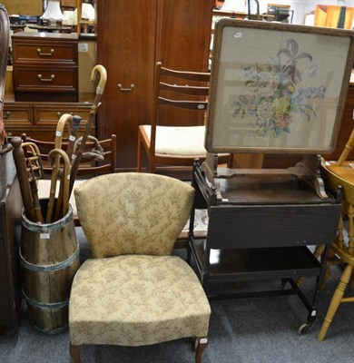 Lot 1083 - A barrel form stick stand, a quantity of sticks, an occasional chair, an oak trolley, a...