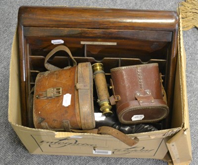 Lot 1095 - Two cased pairs of binoculars, small three draw telescope, stationery cabinet with tambour...