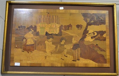 Lot 1121 - A 20th Century marquetry picture, mother and children in landscape, framed, 44cm x 75cm