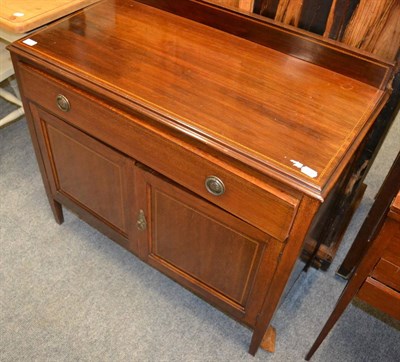 Lot 1209 - An inlaid mahogany cabinet