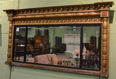 Lot 1212 - A Regency gilt-wood sectional over-mantel mirror