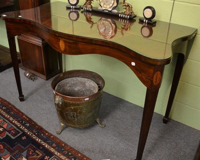 Lot 1214 - A George III mahogany serpentine serving table, inlaid shell detail, square tapered legs to...