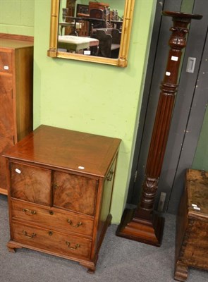 Lot 1219 - A Georgian mahogany commode and a torchere (2)