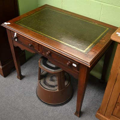 Lot 1227 - A late 19th century mahogany writing table with two drawers