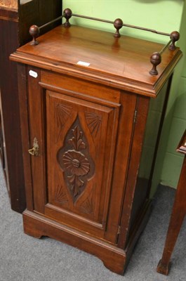 Lot 1228 - Carved mahogany cupboard