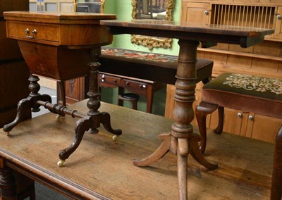 Lot 1234 - A Victorian walnut games and work table and a 19th century tilt top tripod table (2)