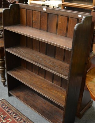 Lot 1245 - An Arts & Crafts oak open bookcase, labelled L to reverse and signed Birkett AD2002