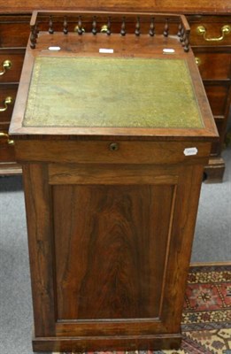 Lot 1258 - An early 19th Century rosewood Davenport desk, 90cm in height