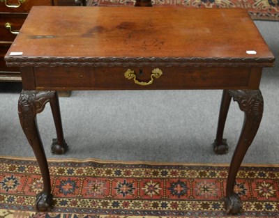 Lot 1259 - An Irish mahogany fold over card table