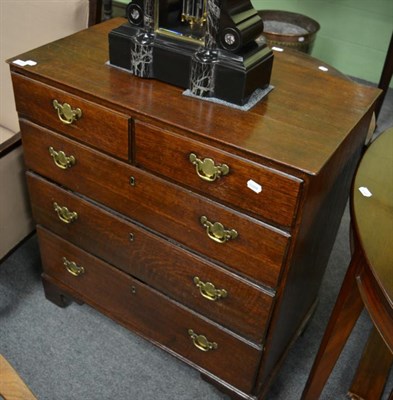 Lot 1264 - An oak chest of drawers