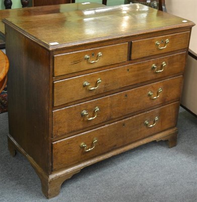 Lot 1266 - A 19th century oak chest of drawers