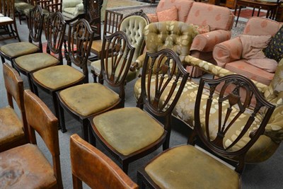 Lot 1272 - A set of six mahogany shield back dining chairs