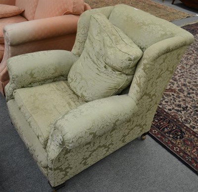 Lot 1285 - A 19th century wing back armchair