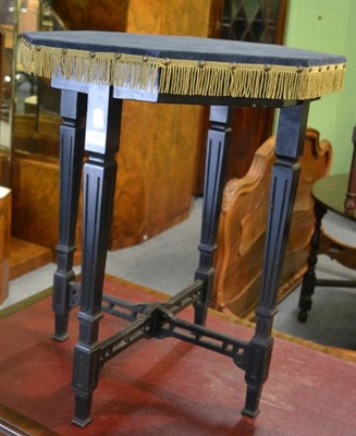 Lot 1305 - A late 19th century aesthetic movement occasional table with blue velvet top