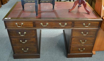 Lot 1307 - A George III style mahogany pedestal desk