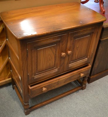 Lot 1317 - An Ercol side cabinet