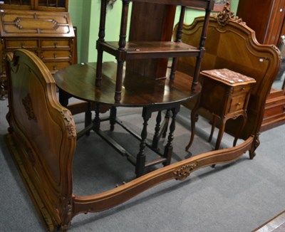 Lot 1319 - A French carved walnut double bedstead together with a matching marble top bedside chest of drawers