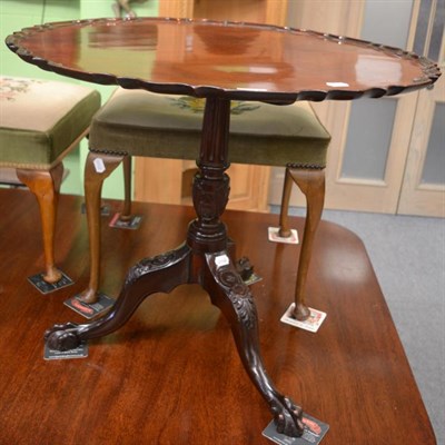 Lot 1325 - A George III mahogany piecrust tilt tip tripod table