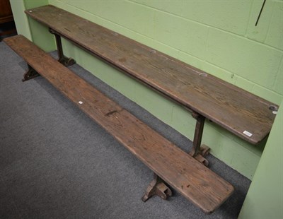 Lot 1332 - A 19th century school desk for six, with fitted bench seat on a cast iron base stamped 'J B & S Guy